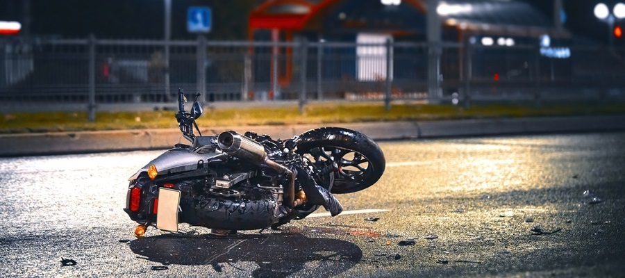 motorcycle in asphalt after a road accident